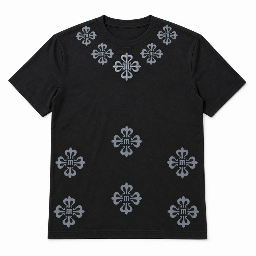 MOMANI Emblem Yoke T-Shirt in Black, laid flat, front view
