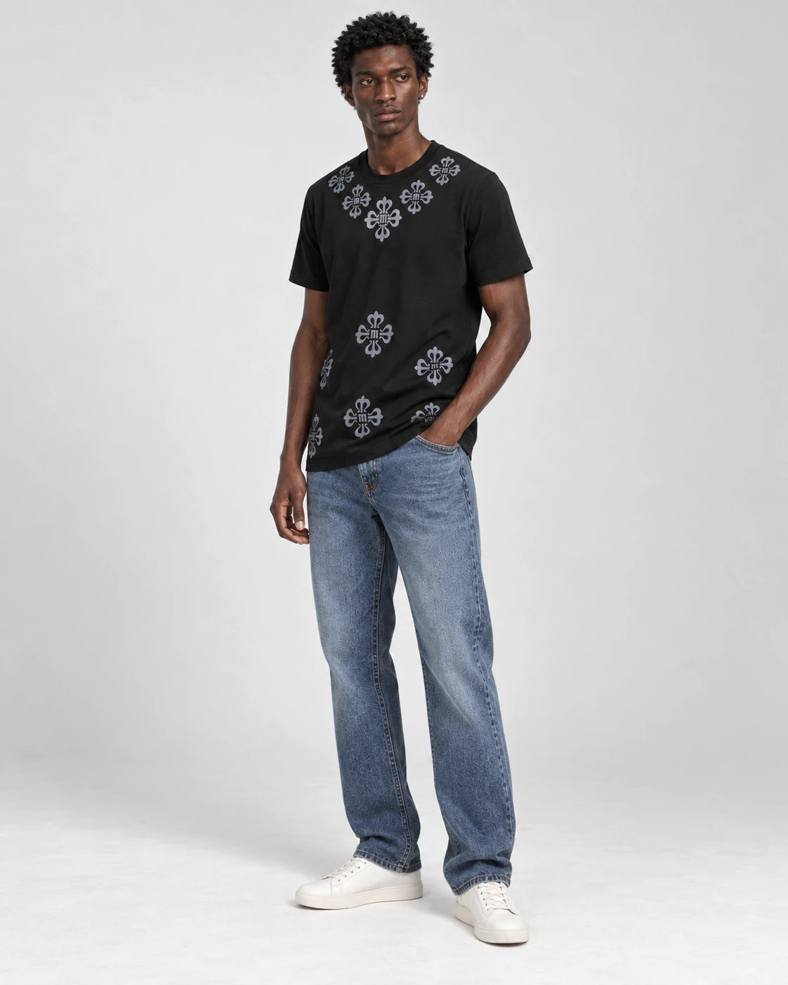 MOMANI Emblem Yoke T-Shirt in Black, worn by a model, three-quarter view