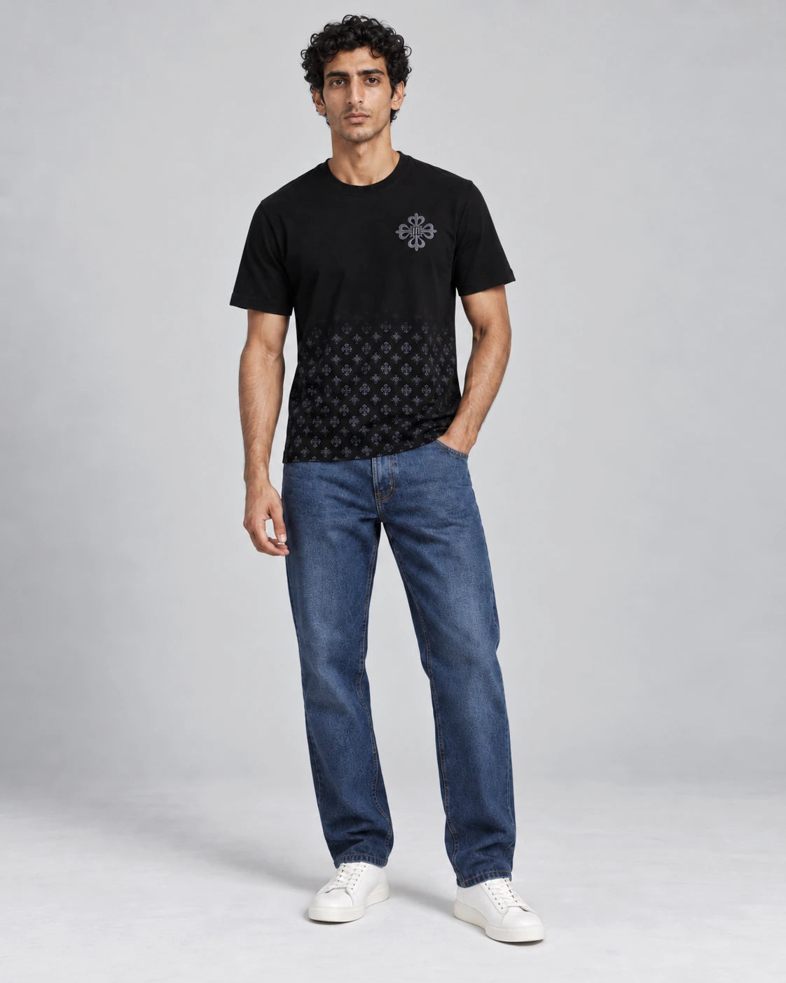 MOMANI Emblem Crest T-Shirt in Black, worn by a model, front view
