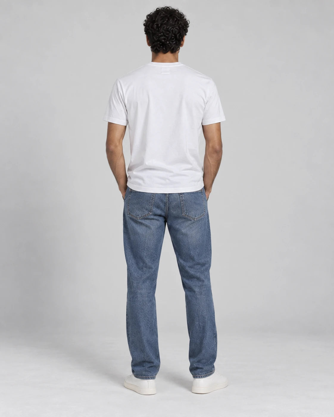MOMANI Emblem Crest T-Shirt in White, worn by a model, back view