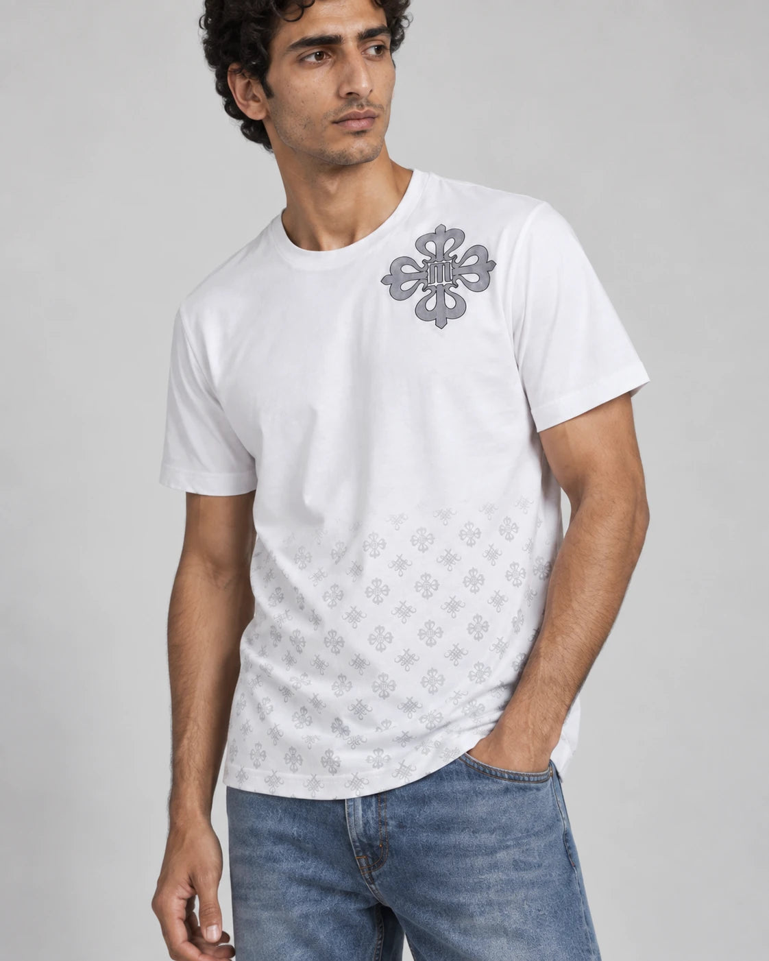 MOMANI Emblem Crest T-Shirt in White, worn by a model, close detail