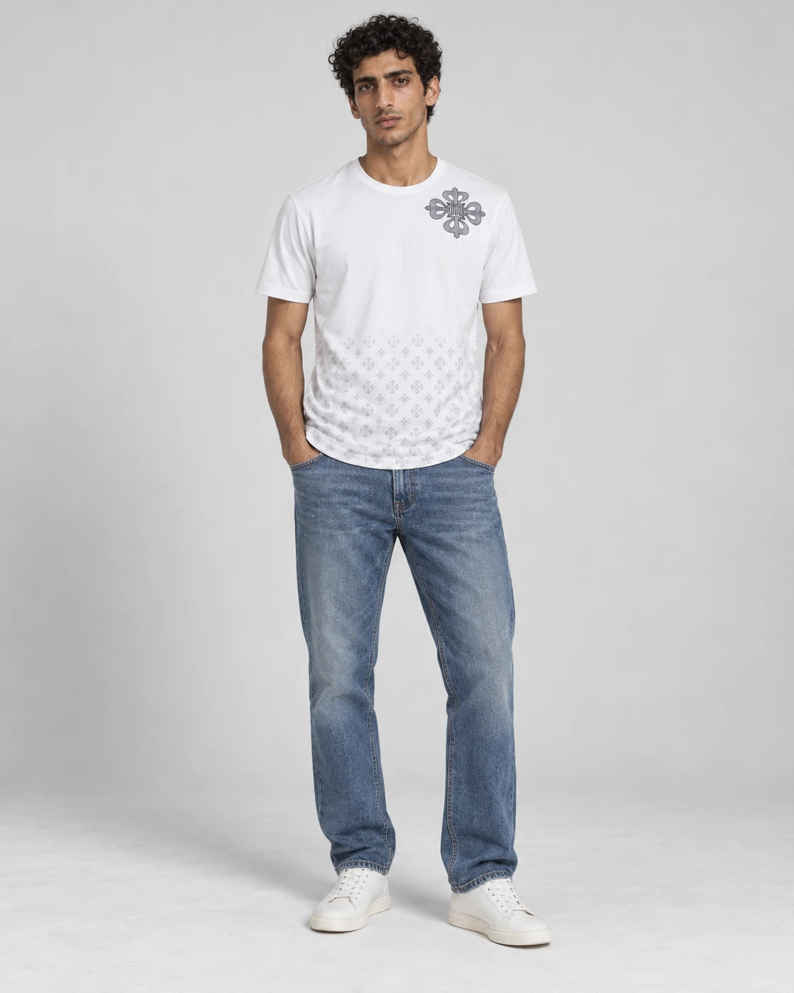 MOMANI Emblem Crest T-Shirt in White, worn by a model, front view