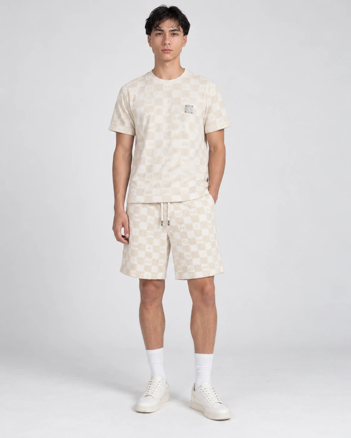 MOMANI Monogram Check T-Shirt in Cream, worn by a model, front view