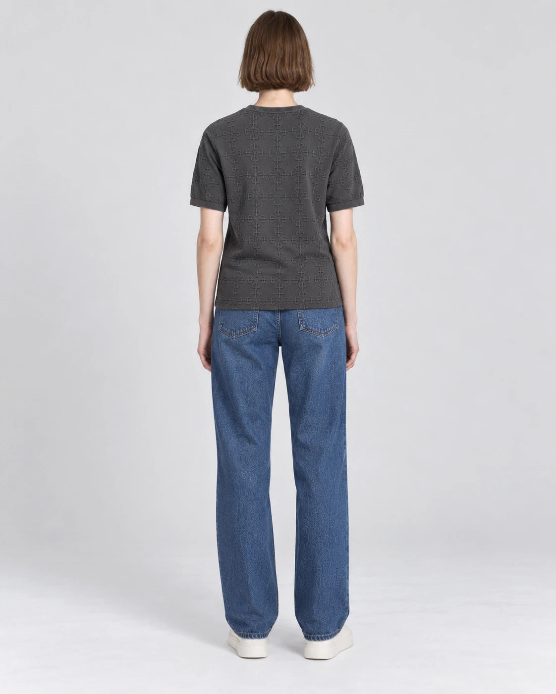 MOMANI Emblem Relief T-Shirt in Grey, worn by a model, back view