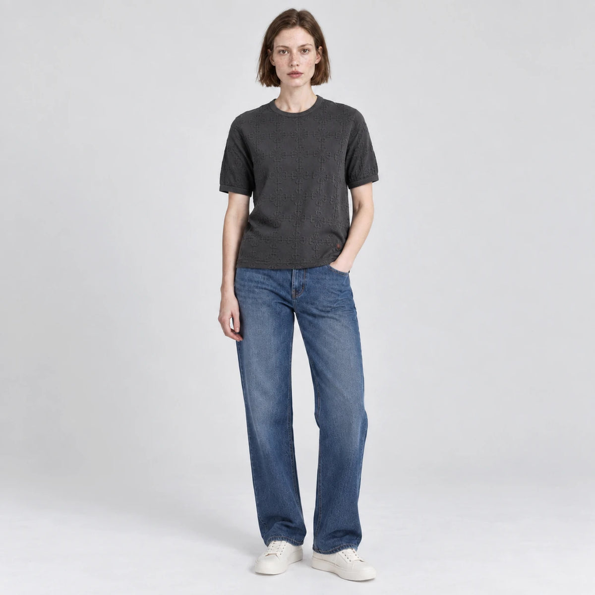 MOMANI Emblem Relief T-Shirt in Grey, worn by a model, front view