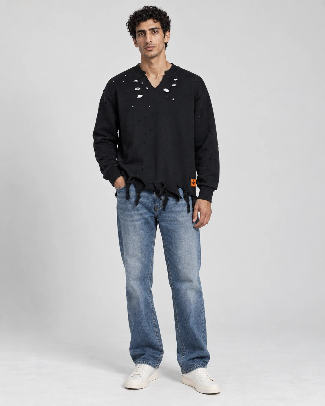 MOMANI Distressed Sweatshirt in Black, worn by a model, front view