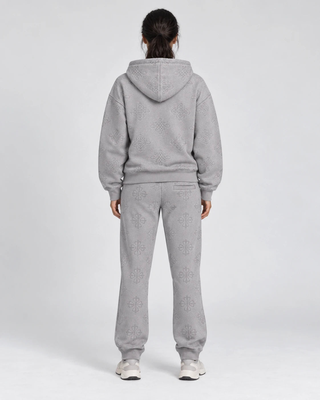 MOMANI Emblem Jacquard Hoodie in Grey, worn by a model, back view