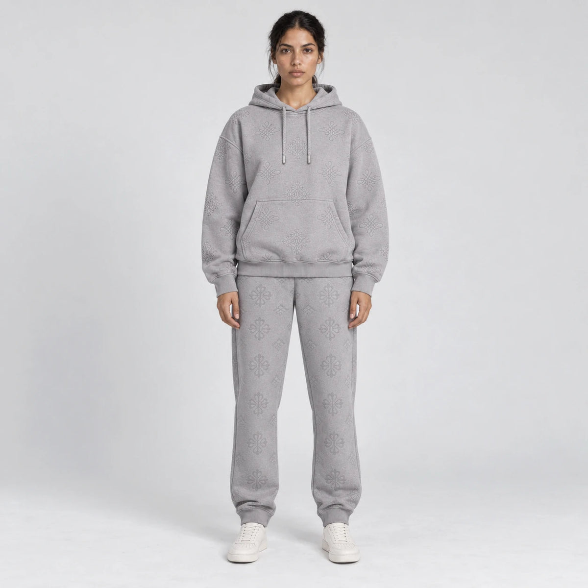 MOMANI Emblem Jacquard Hoodie in Grey, worn by a model, front view