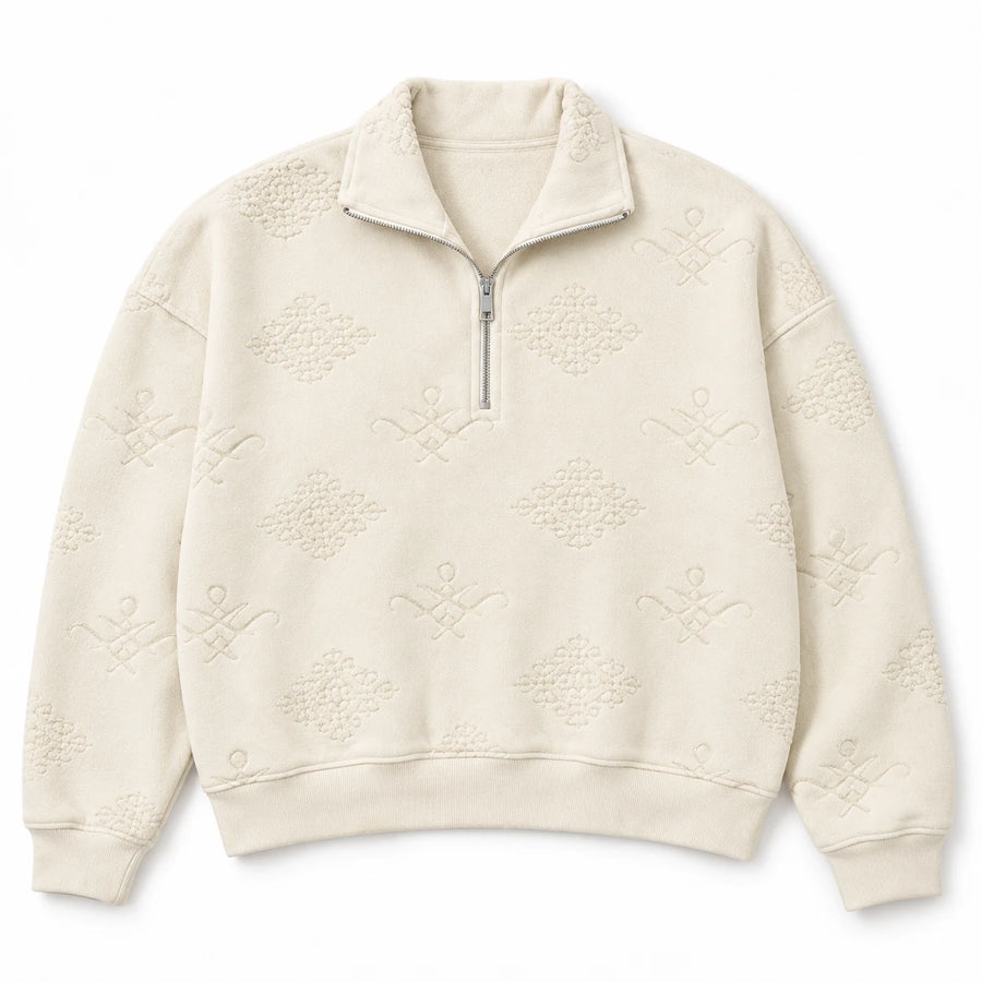 MOMANI Emblem Quarter-Zip Sweatshirt in Cream, laid flat, front view
