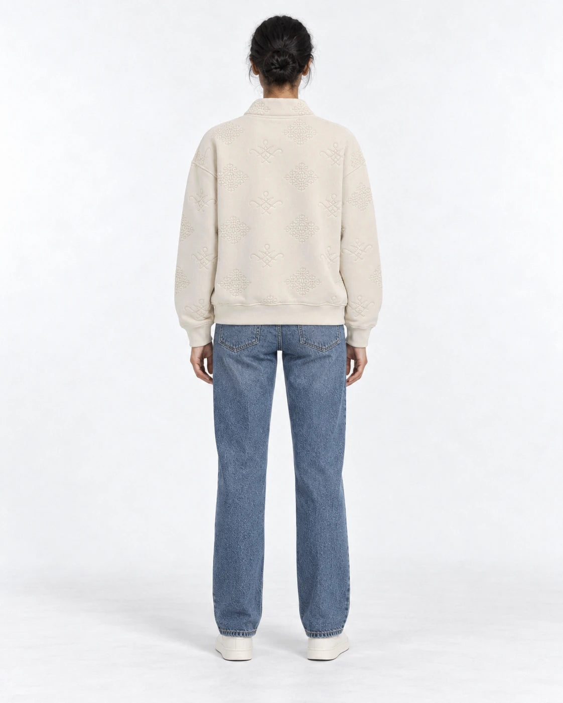 MOMANI Emblem Quarter-Zip Sweatshirt in Cream, worn by a model, back view
