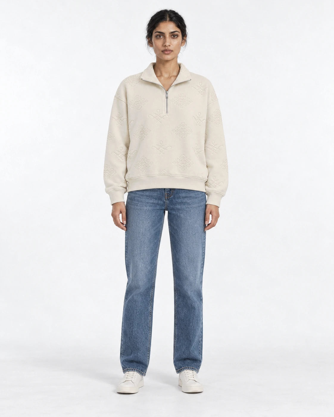 MOMANI Emblem Quarter-Zip Sweatshirt in Cream, worn by a model, front view