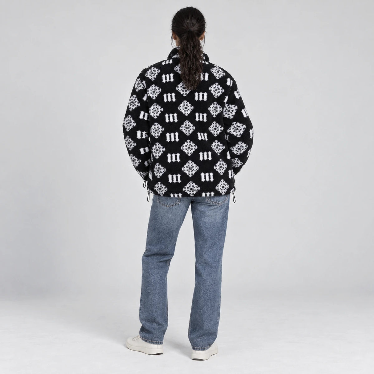 MOMANI Monogram Fleece Coat in Black, worn by a model, back view