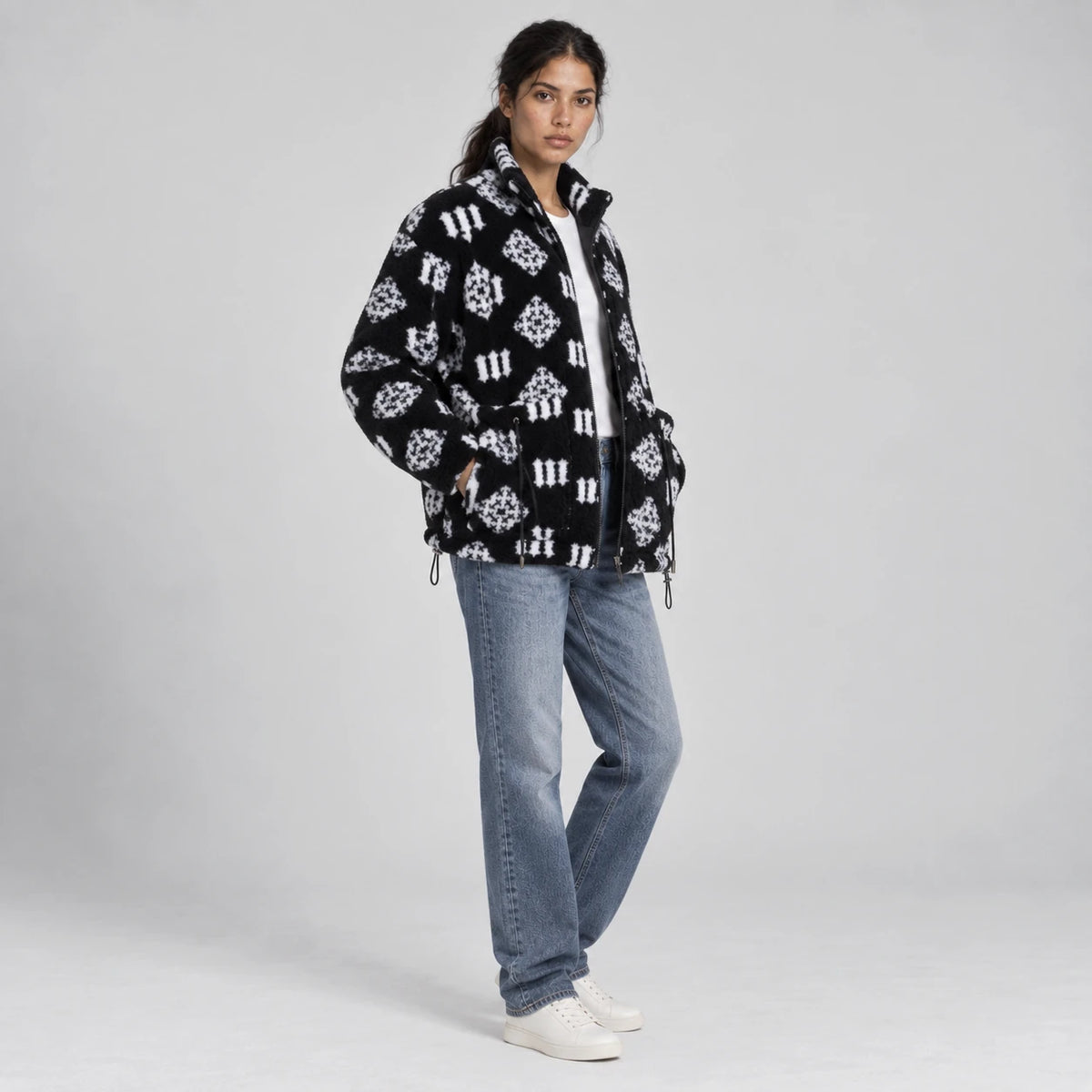 MOMANI Monogram Fleece Coat in Black, worn by a model, three-quarter view